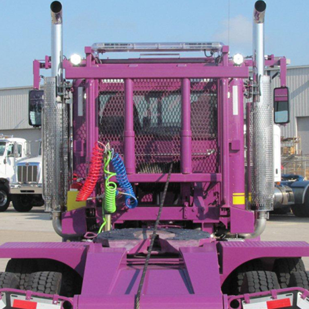 Close up of custom-built roll off truck