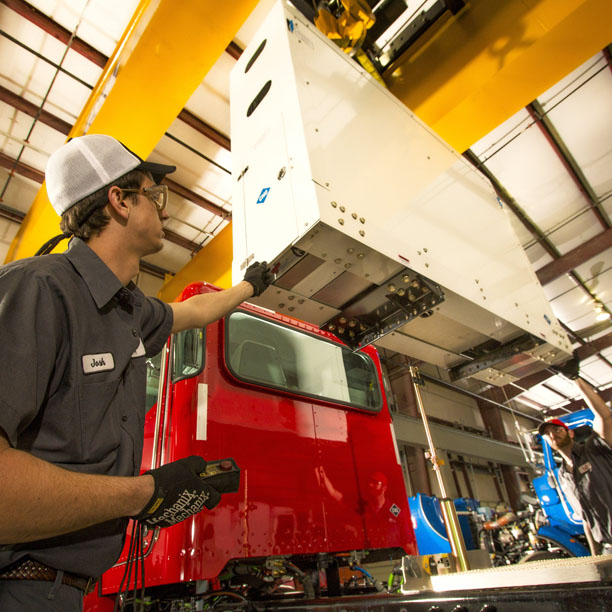 Tech installing CNG fuel system